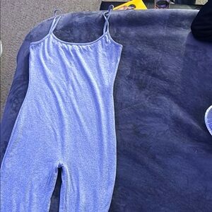 A Solid color light Grey bodysuit with spaghetti straps